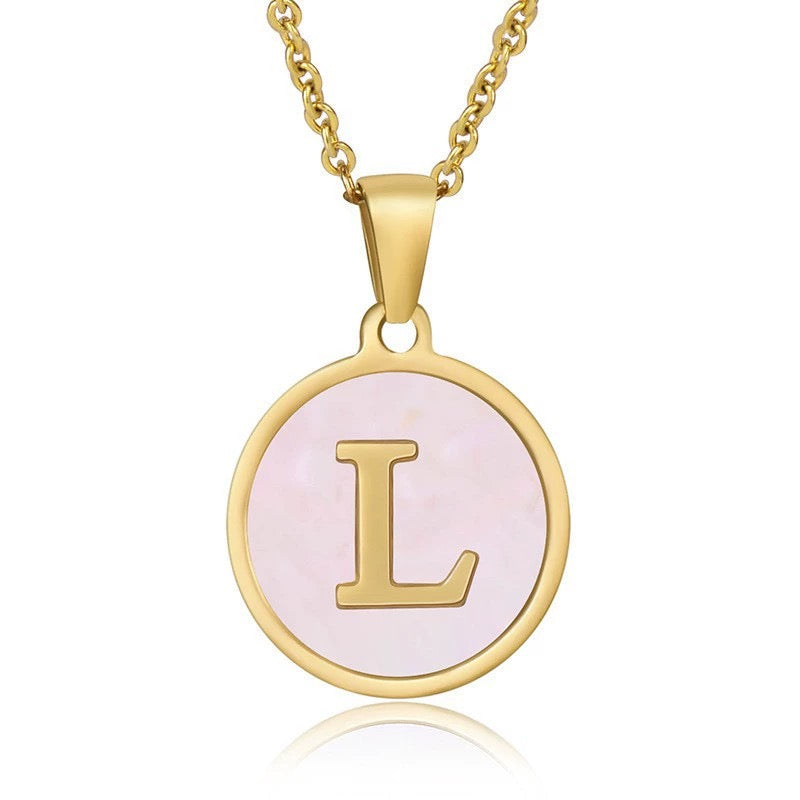 Perrine pink initial disc necklace, letter L on pink mother of pearl