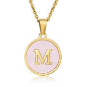 Perrine pink initial disc necklace, letter M on pink mother of pearl
