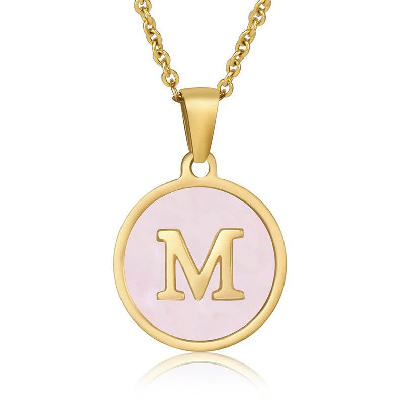 Perrine pink initial disc necklace, letter M on pink mother of pearl