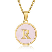 Perrine pink initial disc necklace, letter R on pink mother of pearl