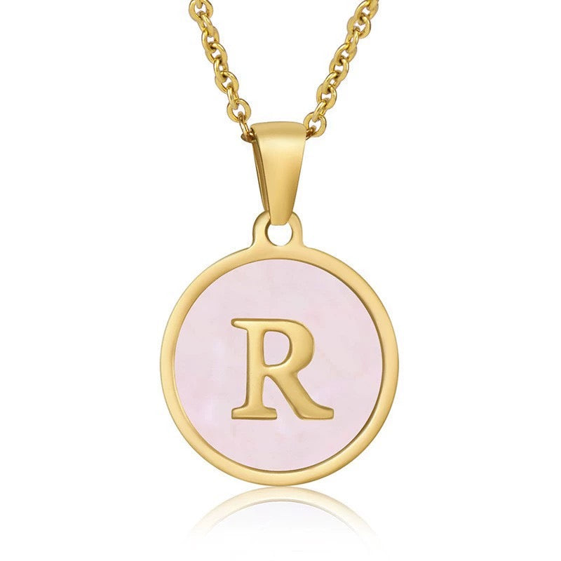 Perrine pink initial disc necklace, letter R on pink mother of pearl
