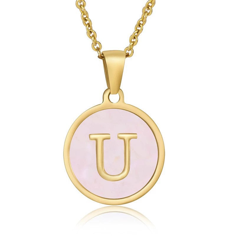 Perrine pink initial disc necklace, letter U on pink mother of pearl
