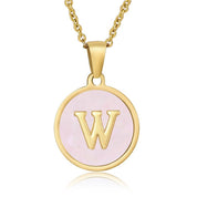 Perrine pink initial disc necklace, letter W on pink mother of pearl