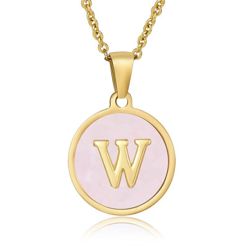 Perrine pink initial disc necklace, letter W on pink mother of pearl