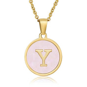 Perrine pink initial disc necklace, letter Y on pink mother of pearl