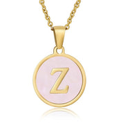 Perrine pink initial disc necklace, letter Z on pink mother of pearl