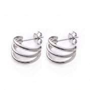 Pair of polished silver triple hoop earrings on white