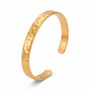 Gold hammered open cuff bracelet on white