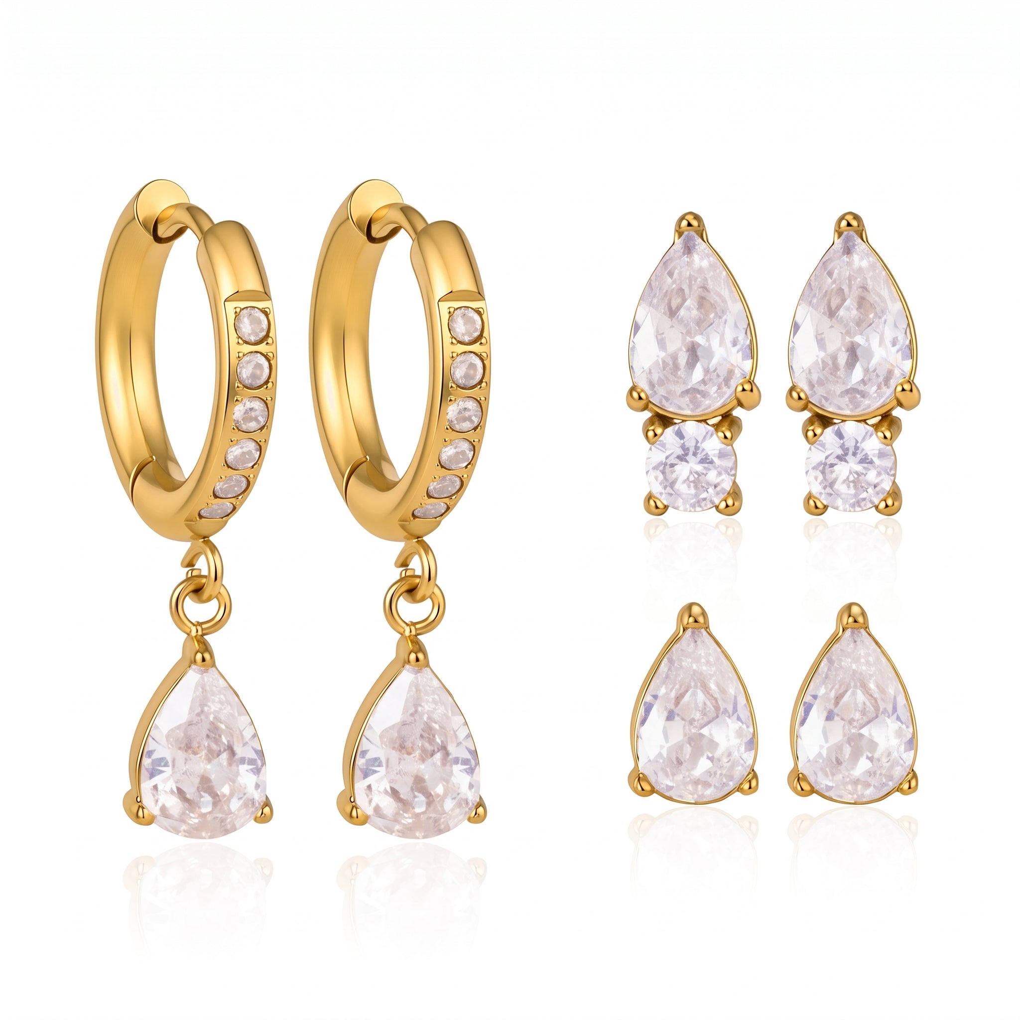 Gold earring set: huggie hoops and two pairs of crystal studs