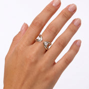 Silver pear stone open ring worn on the ring finger