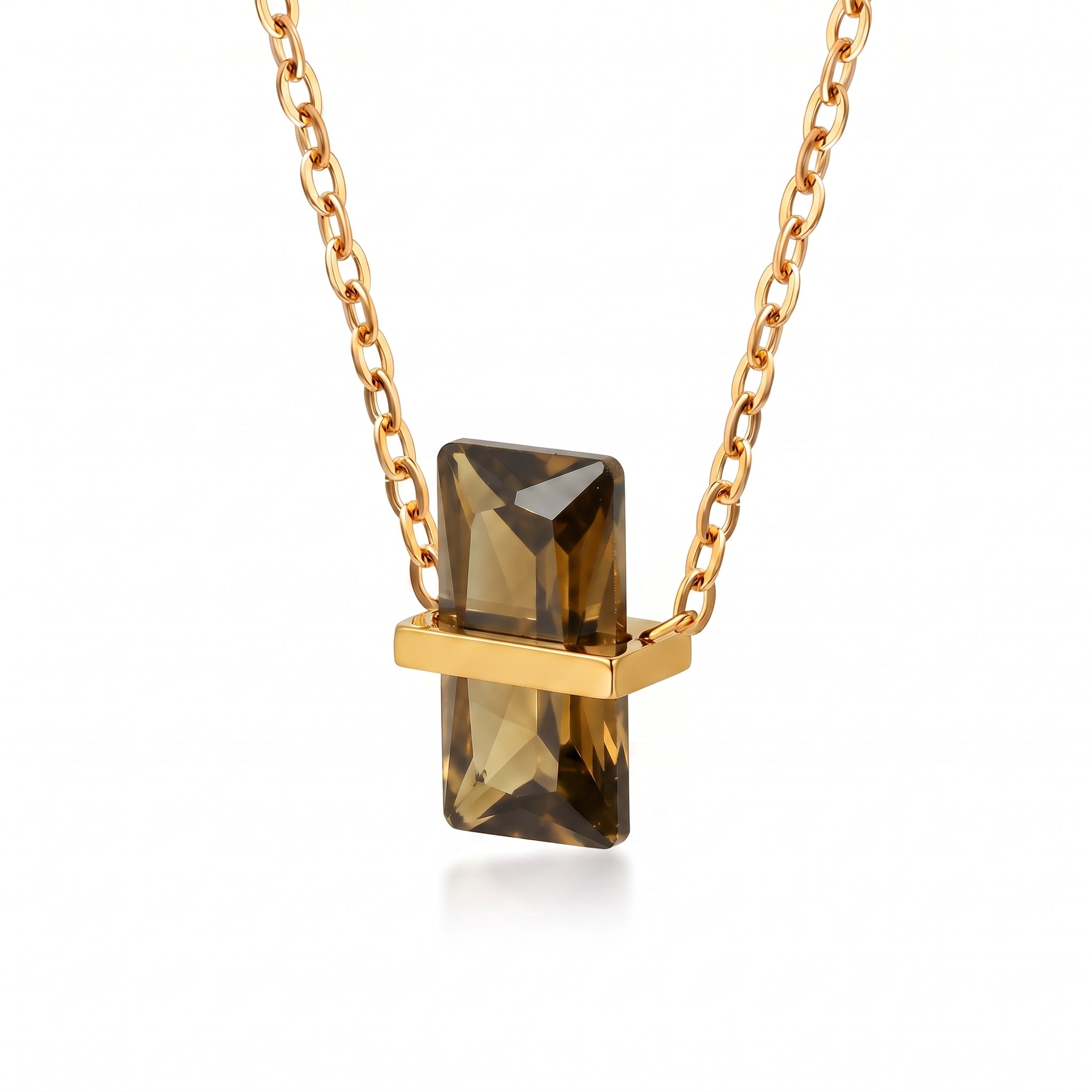 Gold birthstone necklace with an olive brown rectangular crystal