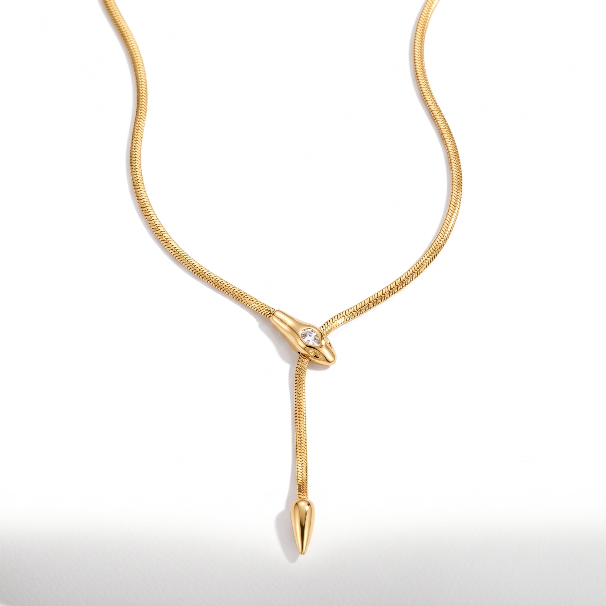 Vesper gold snake lariat necklace, on white
