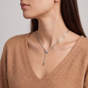 Vesper silver snake lariat necklace, over-the-shoulder view
